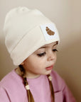 RIB BEANIE CROISSANT 'ALMOND'